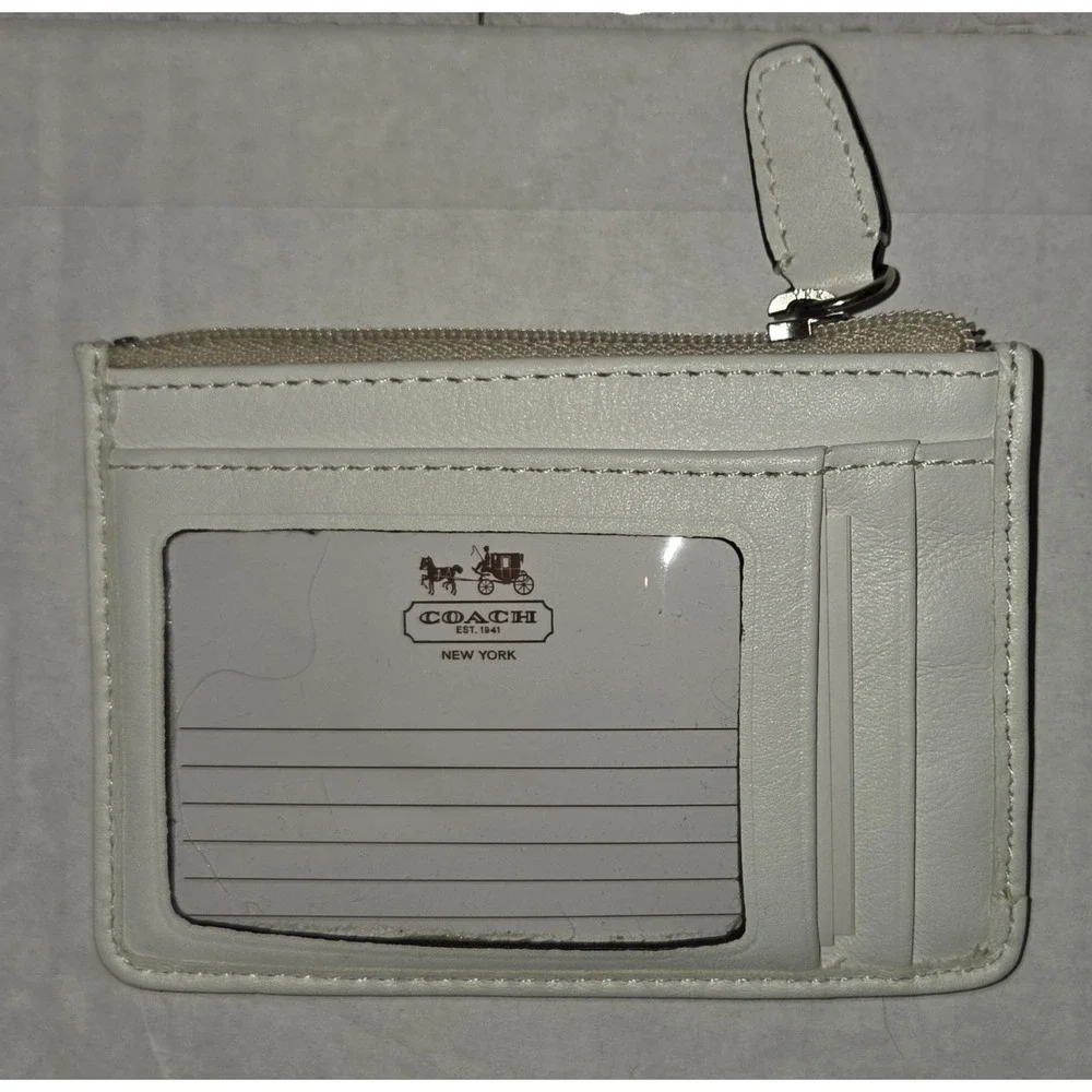 NWT Legacy Print Signature Mini SkinnyID Case. Ivory Khaki. 2013 Line